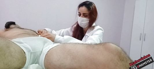 Nurse and aesthetics observes patient's erection